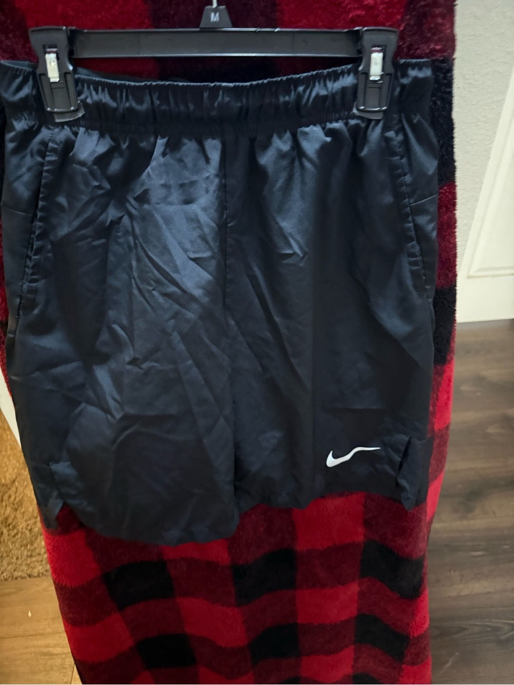 Nike Black Athletic Shorts with White Swoosh Logo